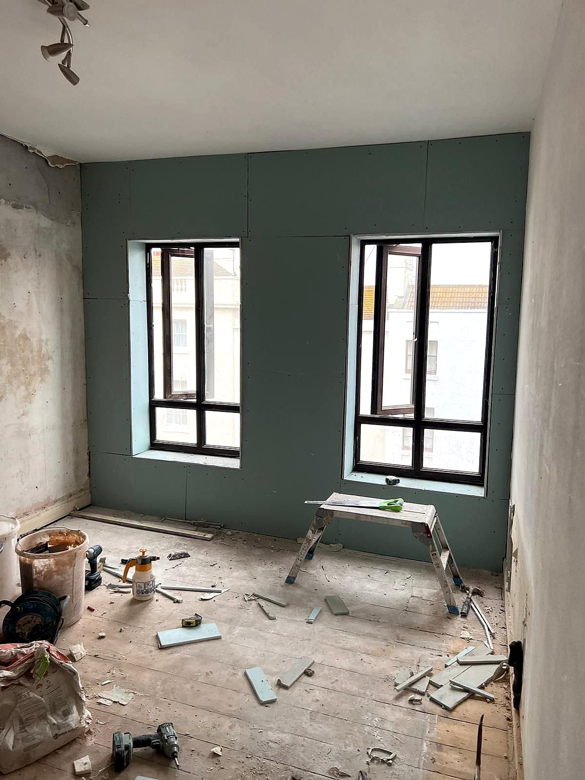 Room with Celotex insulation fitted in stud wall framing around window ready for plasterboarding in Broadstairs